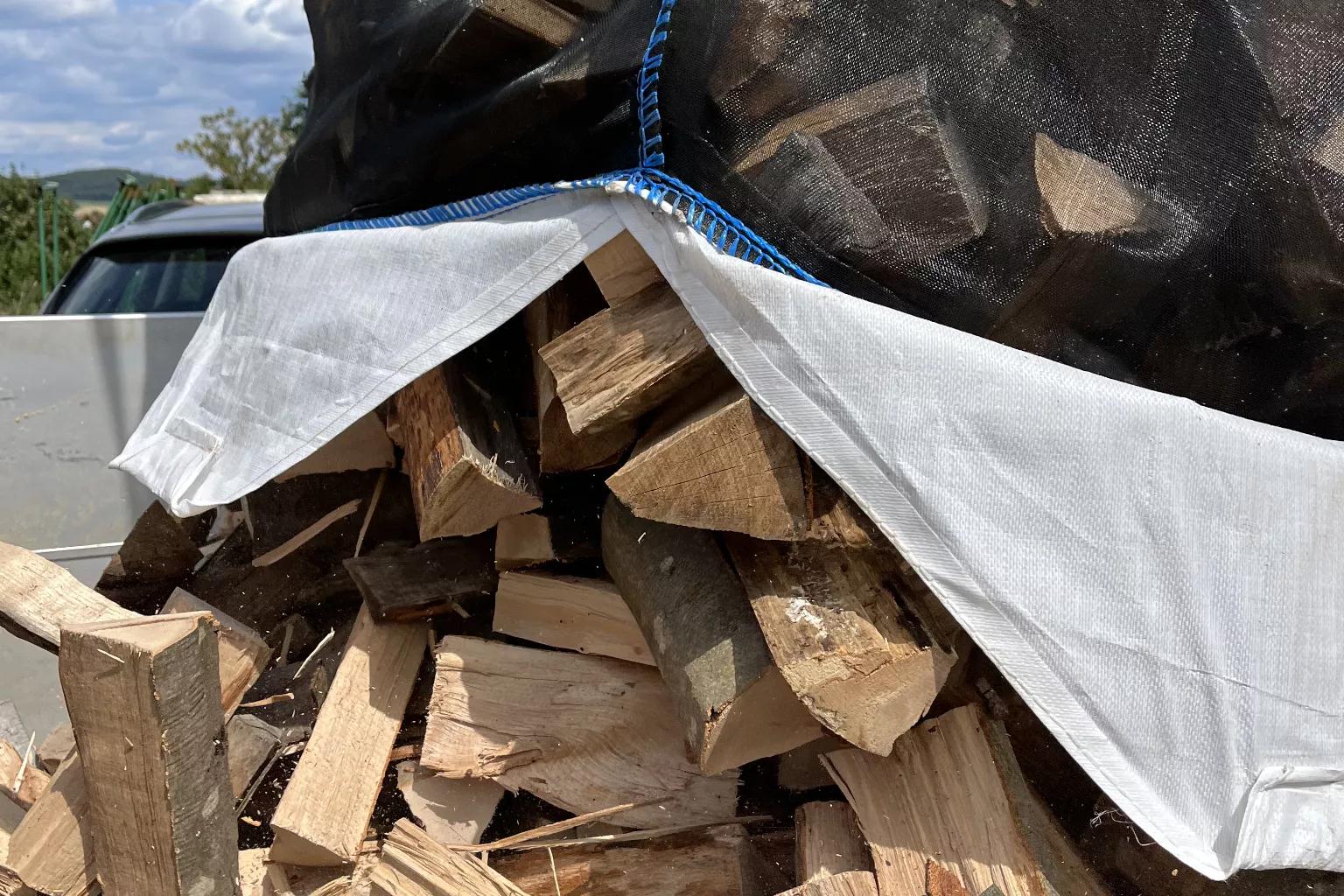Brennholz im Holz Big Bag, 25 cm Scheitholz Brennholz im Holz Big Bag, 25 cm Scheitholz